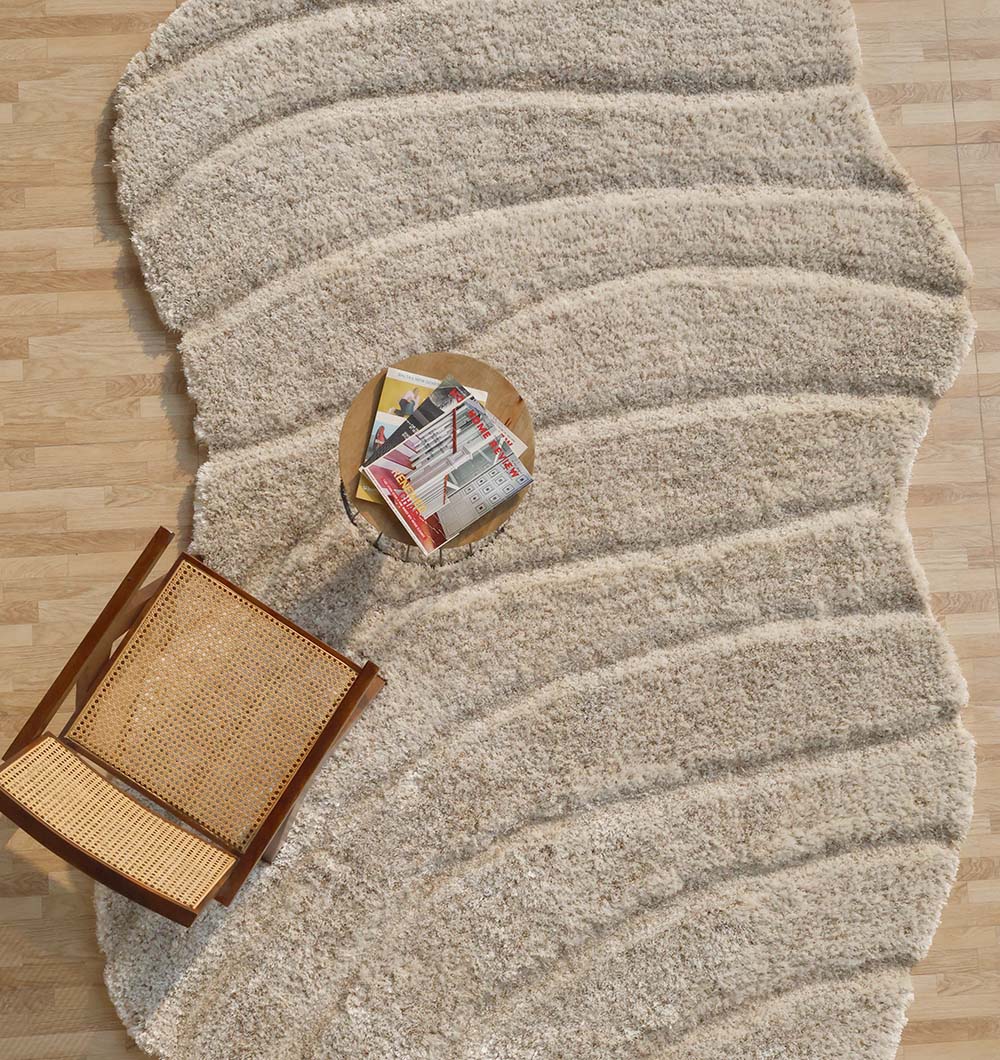 Overhead view of the irregular shaggy rug in a styled room, emphasizing its unique character and the warmth it brings to the space.