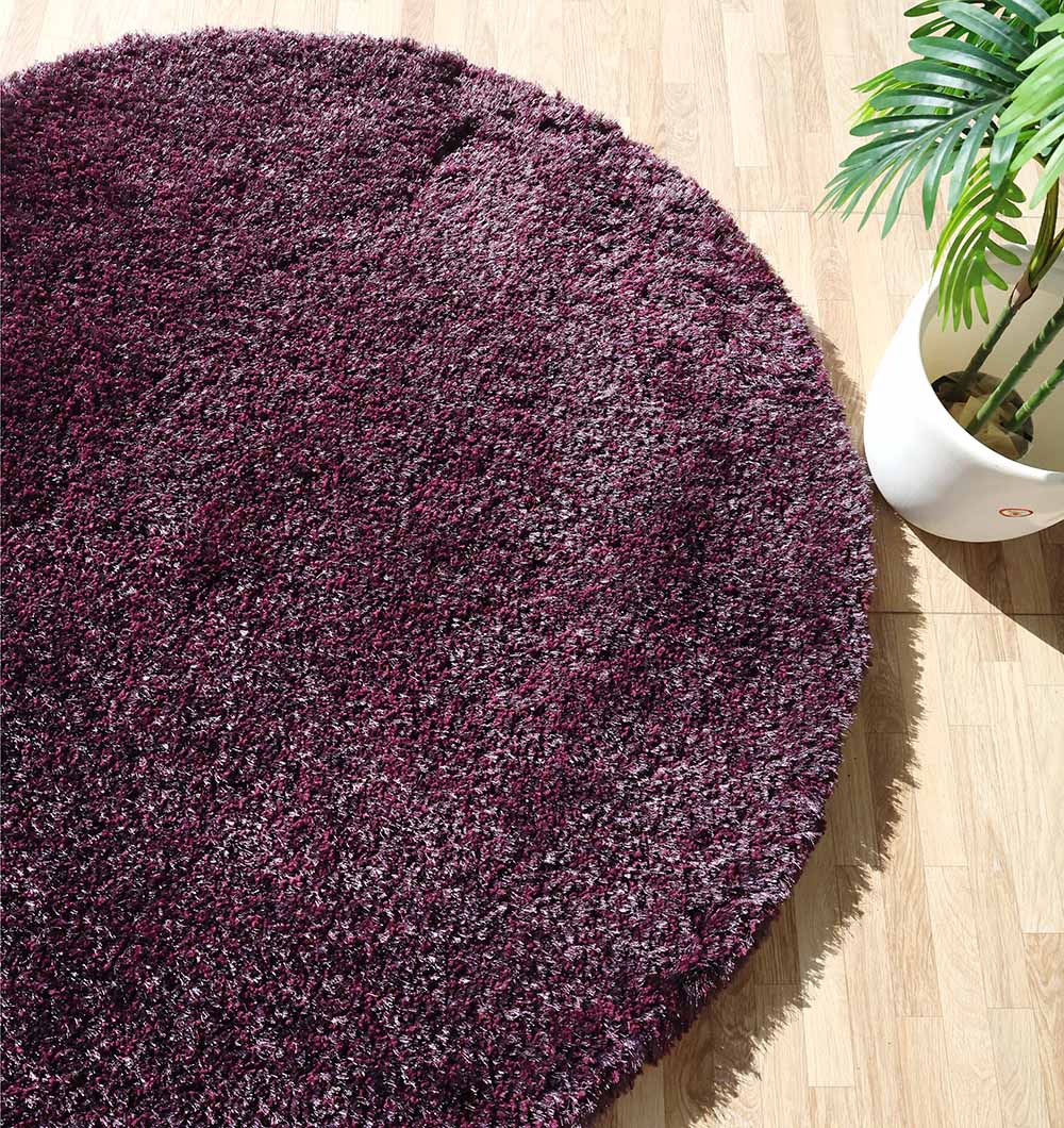 Angled side image of the handmade irregular rug, highlighting its durability and warmth as a high-quality home addition.