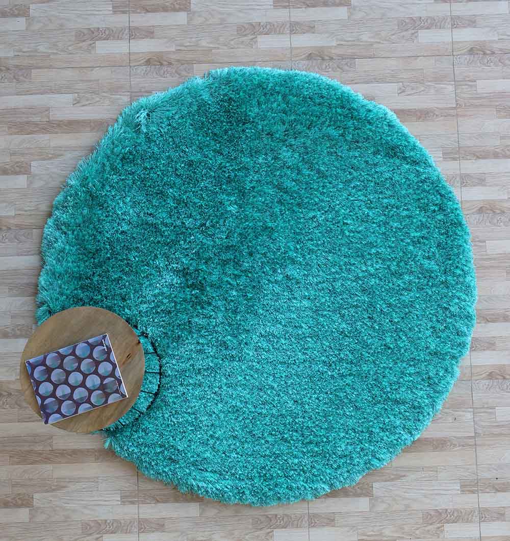 Thick shaggy round shape rug in blue, an ultra soft plush carpet perfect for the bedroom or living area.