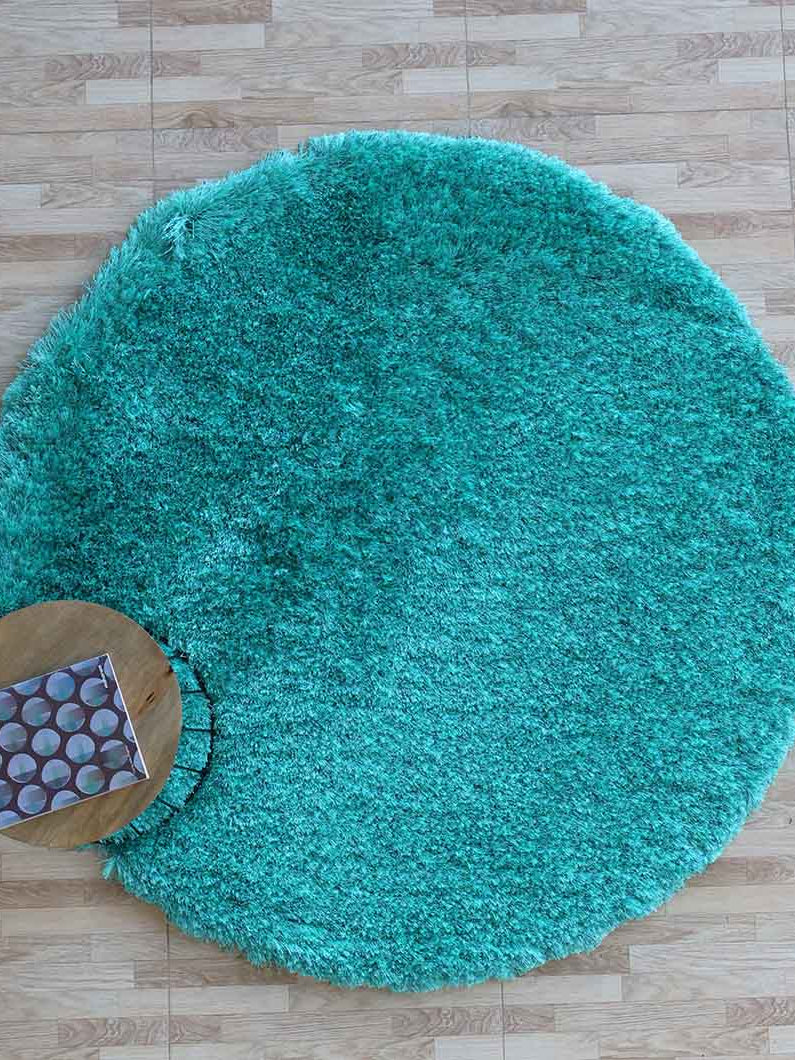 Thick shaggy round shape rug in blue, an ultra soft plush carpet perfect for the bedroom or living area.