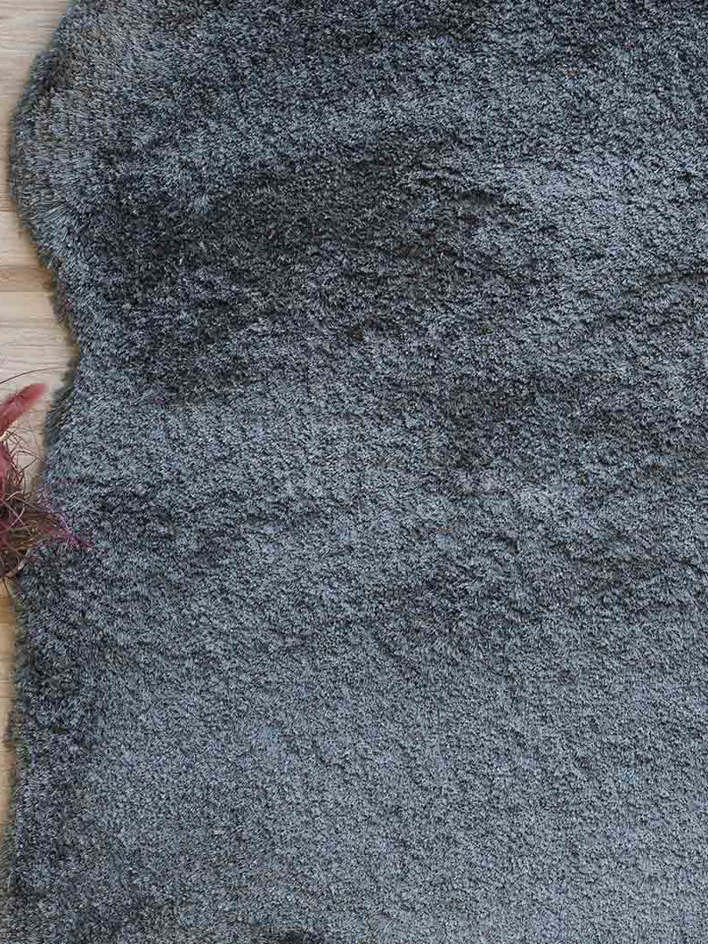 Close-up detailing the plush texture from the $80% polyester blend, providing warmth and comfort with expert craftsmanship.