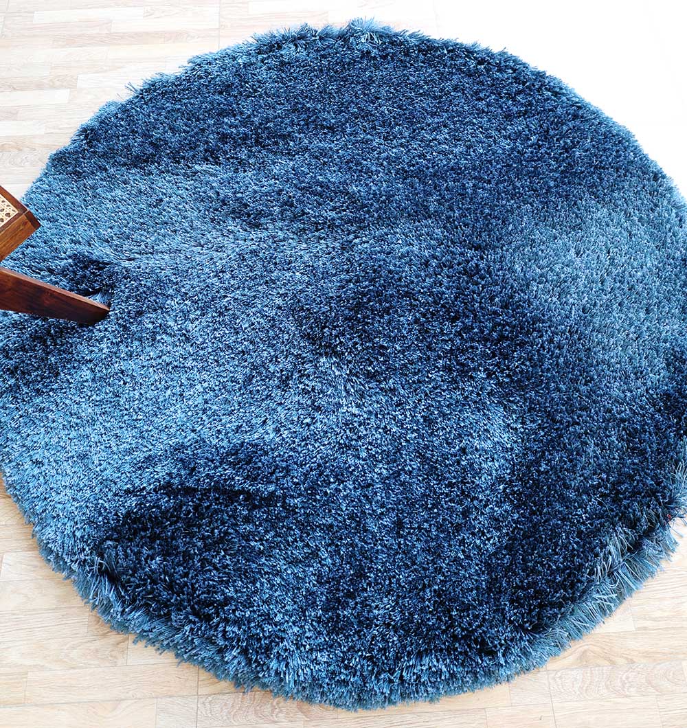 Irregular blue color plush rug, featuring a modern shaggy design for superior softness and durability.
