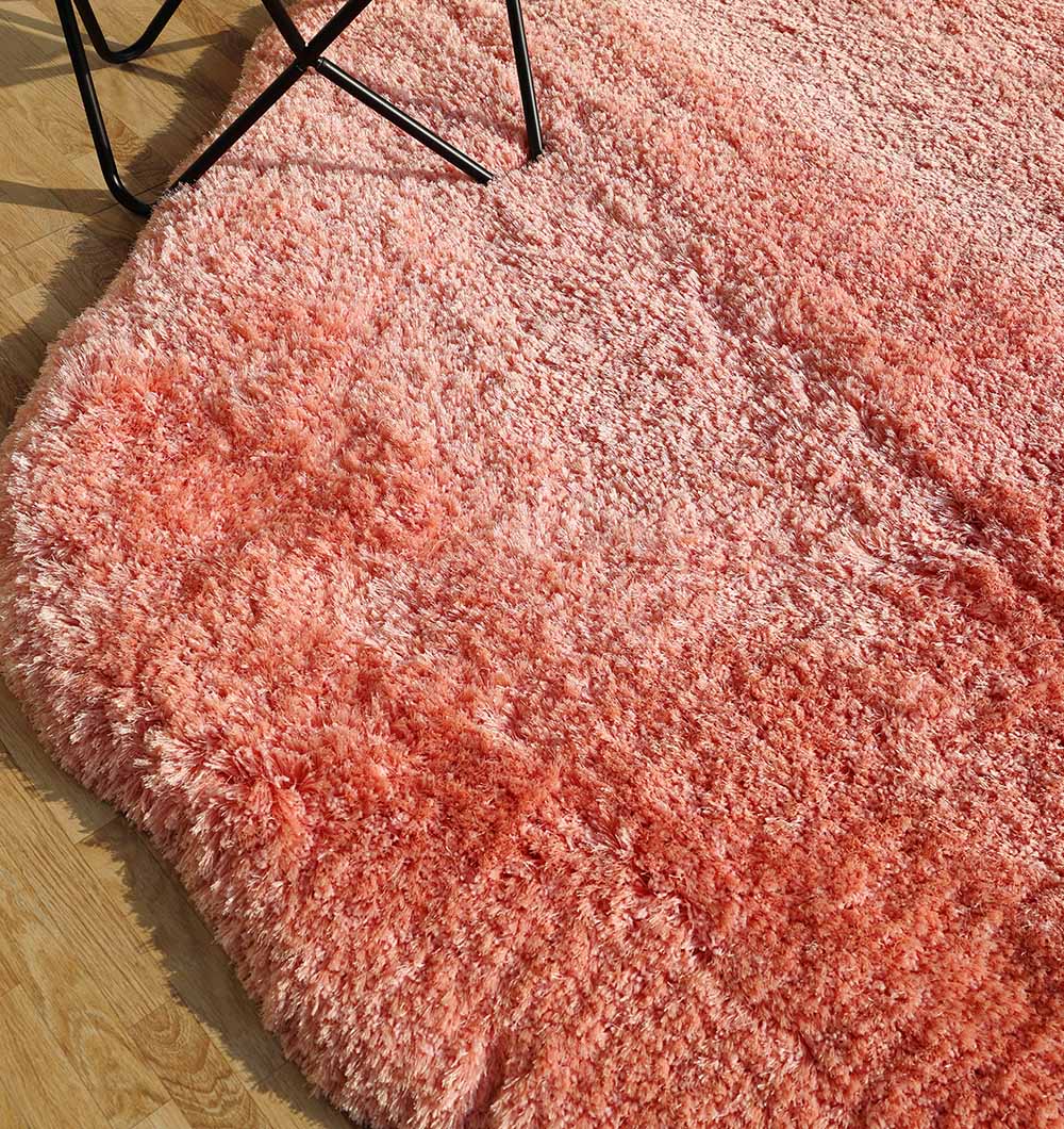 Profile view of the irregular shaped rug, showcasing its modern design and sophisticated aesthetic.