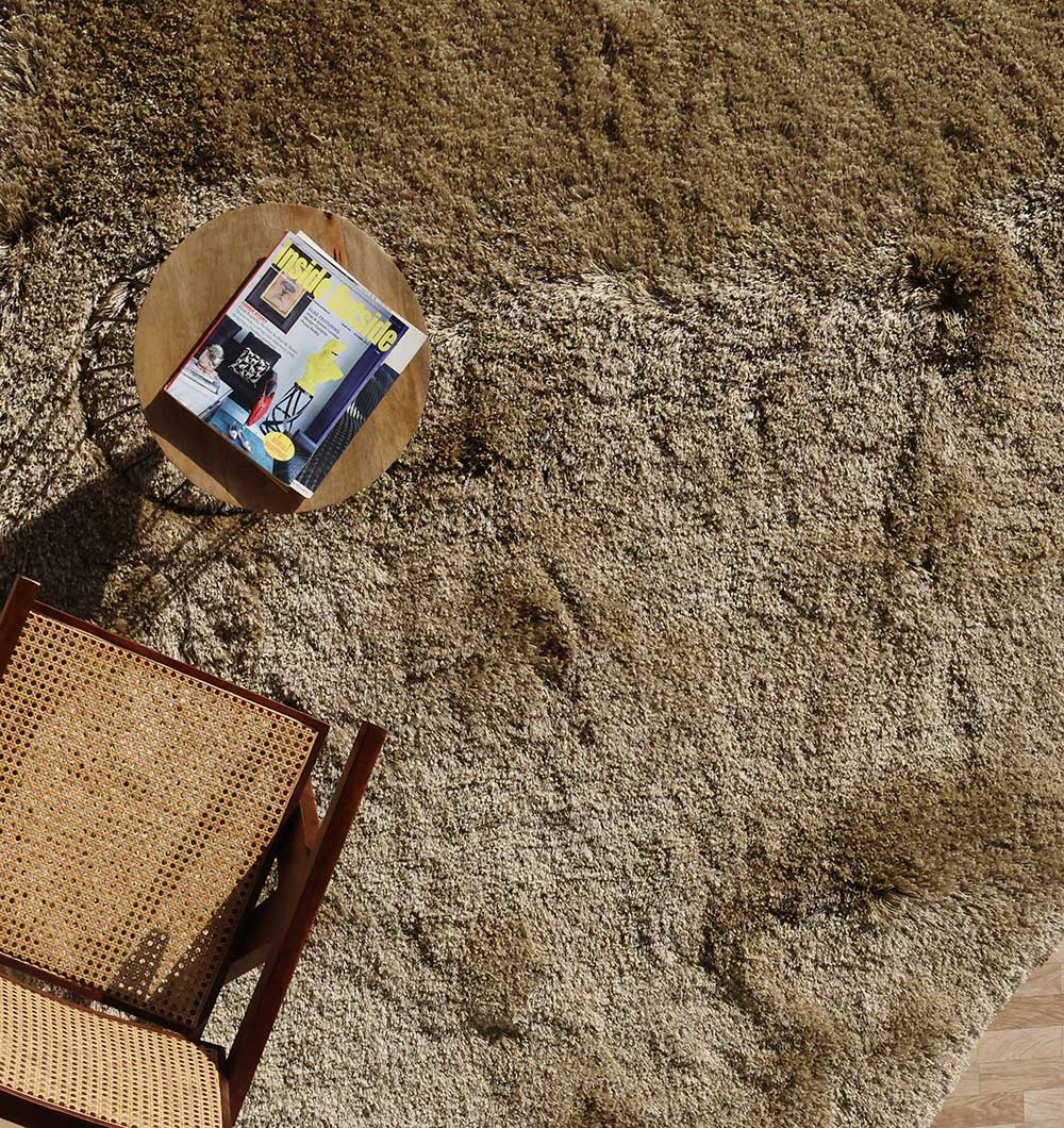 Top-down view showcasing the full irregular shape and modern shaggy design, perfect for the bedroom or living area.