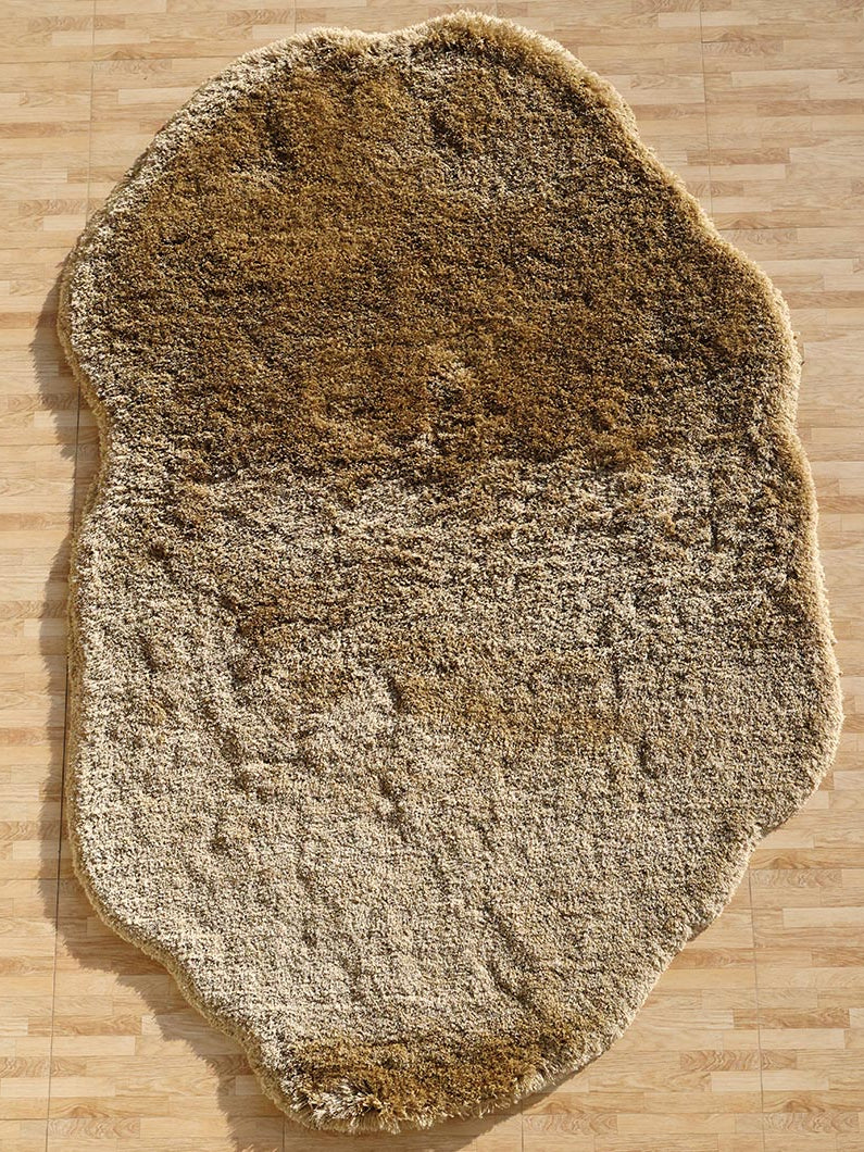 Main product image of the thick shaggy irregular shape rug in brown, adding a soft plush carpet touch to any room.
