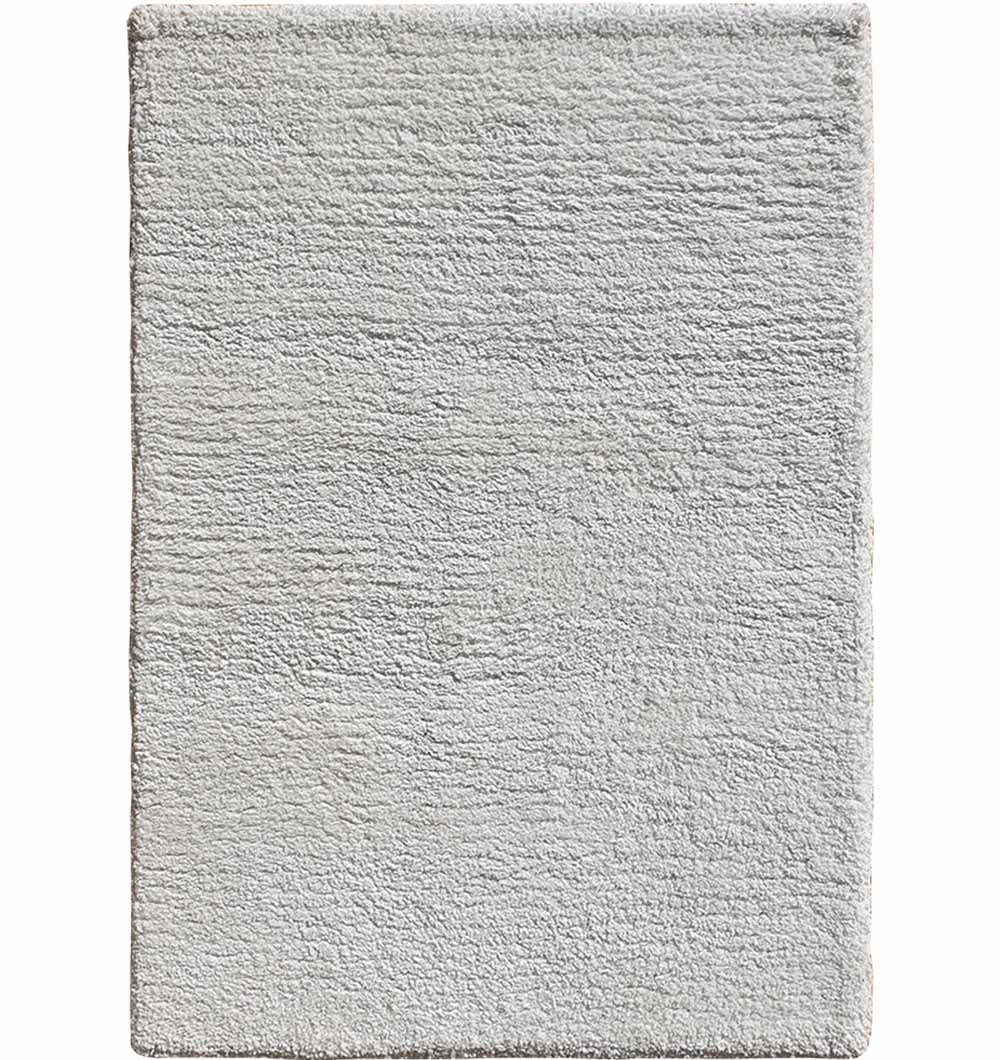 Main product image of the handmade white shaggy runner rug, providing durable and stylish comfort for narrow spaces.