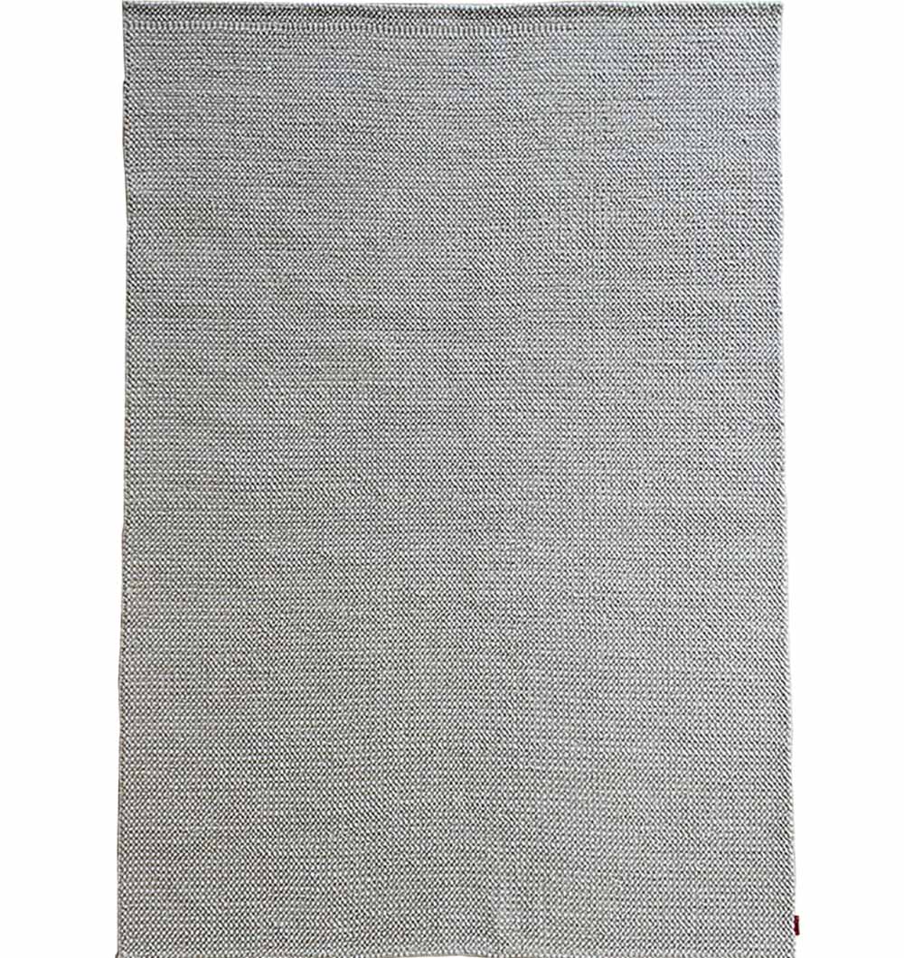 Handmade natural white woven area rug, 100% polyester, designed for high durability and a contemporary look.