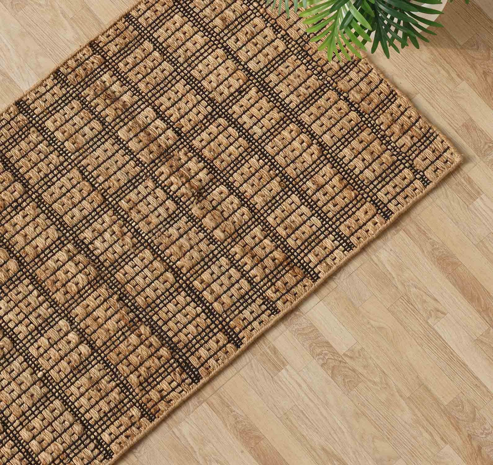 View highlighting the natural warmth and versatile texture of the jute floor covering in an entryway setting.