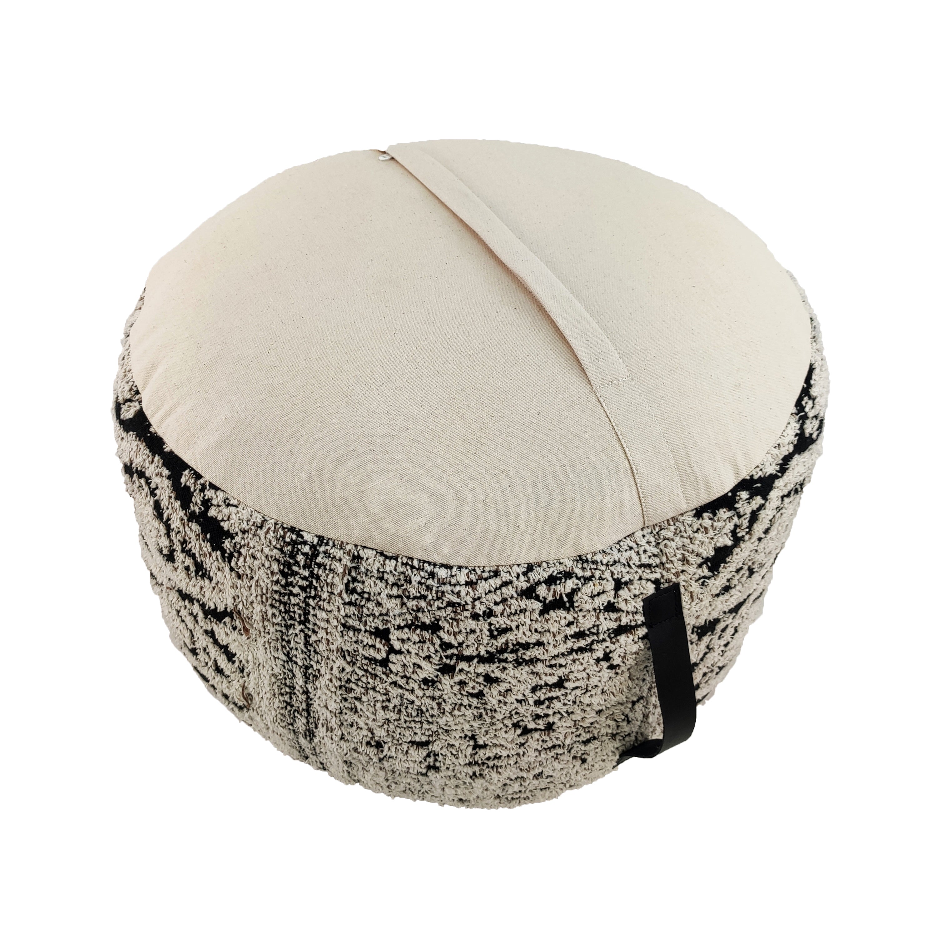 Back view of black & white pouf showing woven cotton fabric and handle