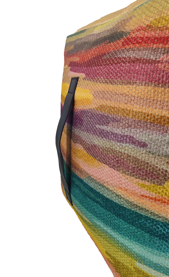 Close-up of PF-119 pouf showing vibrant printed polyester fabric and woven texture