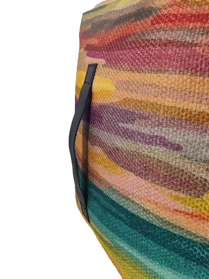 Close-up of PF-119 pouf showing vibrant printed polyester fabric and woven texture