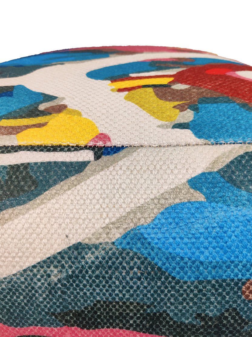 Detailed view of handmade pouf PF-121 highlighting colorful pattern and woven texture